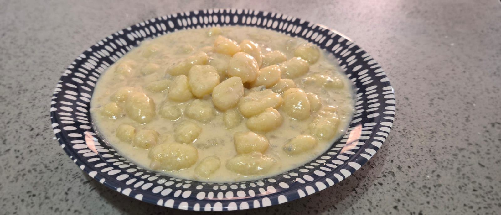 Gnocci con gorgonzola y pera